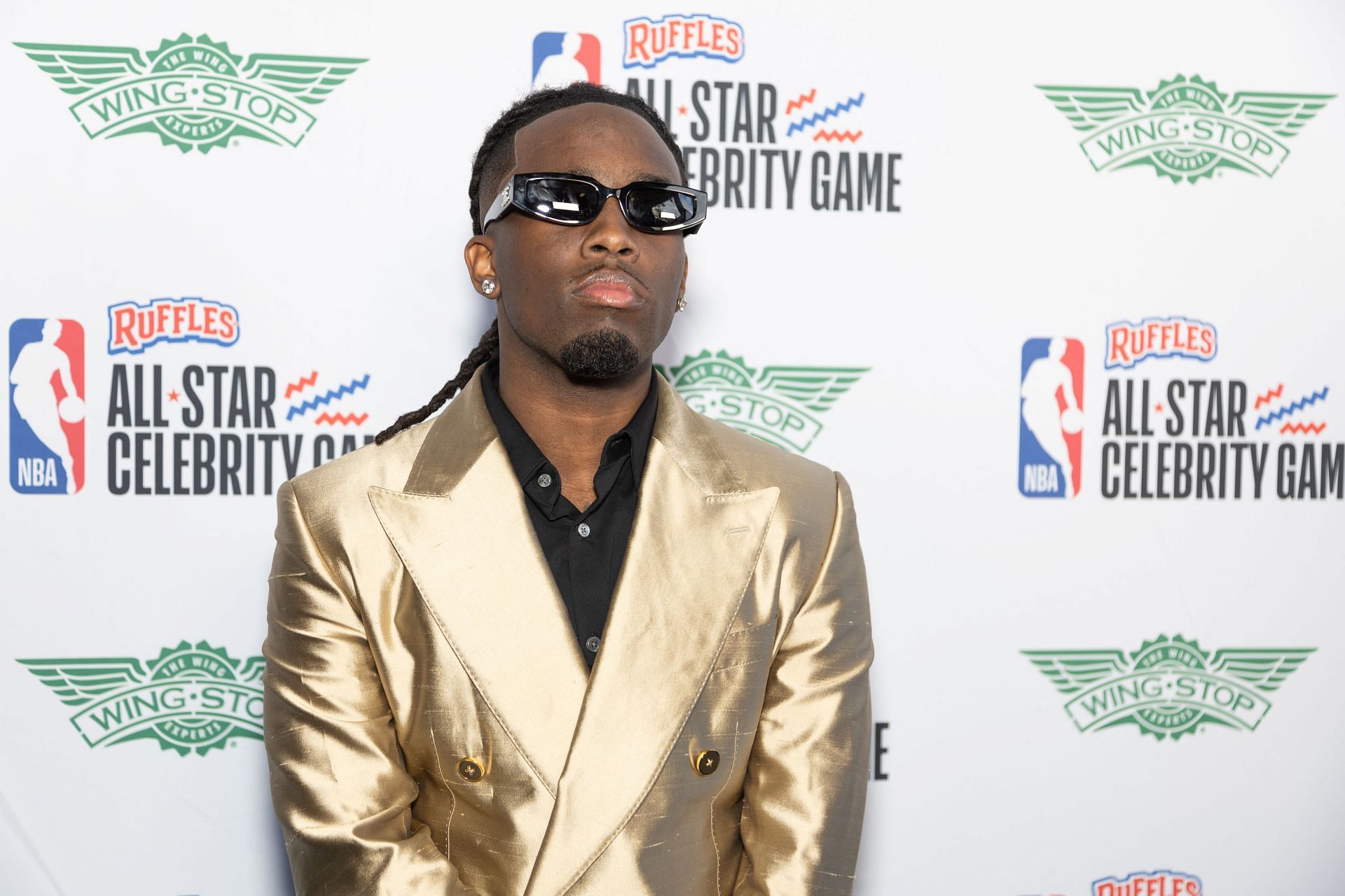 Content creator and founder of Streamer University, Kai Cenat, attending the 2025 Ruffles NBA All-Star Celebrity Game Green Carpet - (Image via Getty)